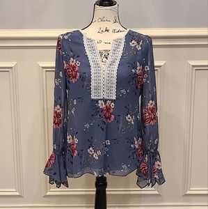 Blue floral print blouse by: White House Black Market(used)